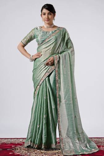 Bollywood green emboriderd border satin saree with unstitched blouse