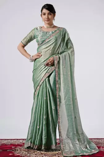 Bollywood green emboriderd border satin saree with unstitched blouse