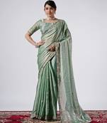 Bollywood green emboriderd border satin saree with unstitched blouse