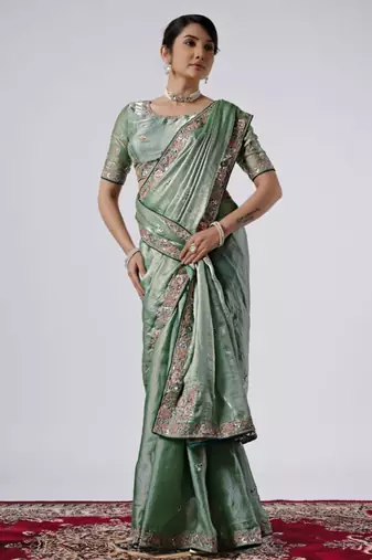 Bollywood green emboriderd border satin saree with unstitched blouse