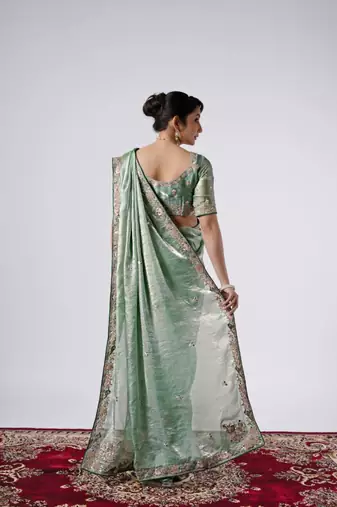 Bollywood green emboriderd border satin saree with unstitched blouse