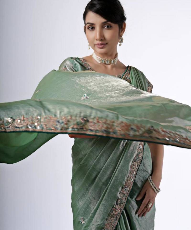 Bollywood green emboriderd border satin saree with unstitched blouse