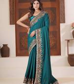 Pure firozi heavy multi colored border fandy satinsaree with unstitched blouse