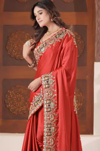 Fashionable red heavy multi colored border fandy satin saree with unstitched blouse