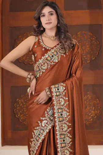 soft silk blend rust heavy multi colored border fandy satin saree with unstitched blouse