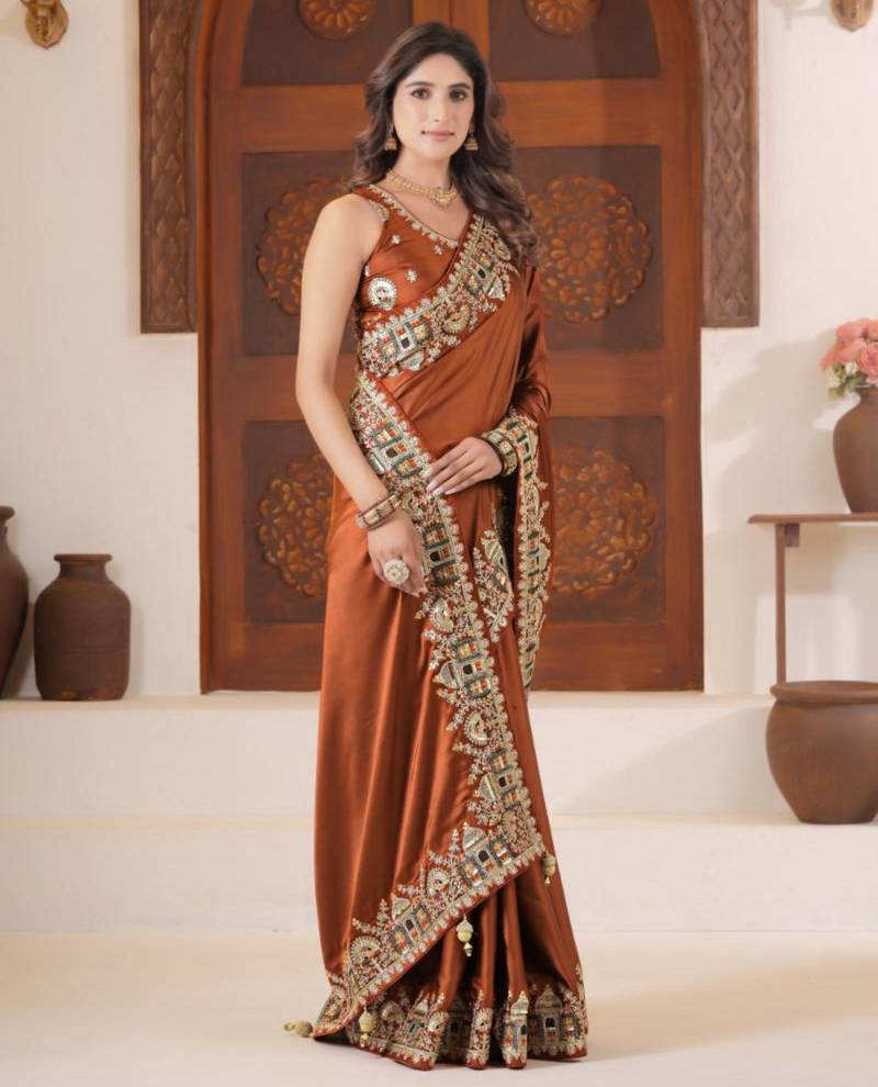 soft silk blend rust heavy multi colored border fandy satin saree with unstitched blouse