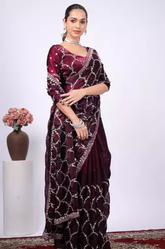 Celebrity type purple embroidered border fandy satin saree with unstitched blouse