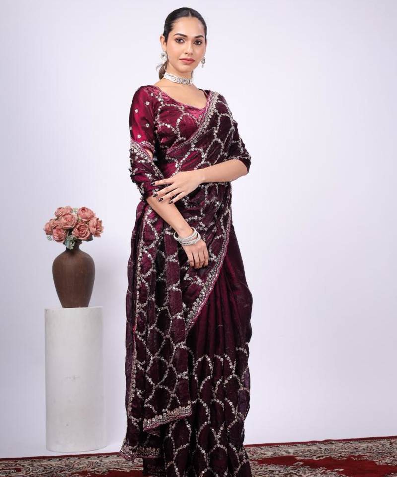 Celebrity type purple embroidered border fandy satin saree with unstitched blouse