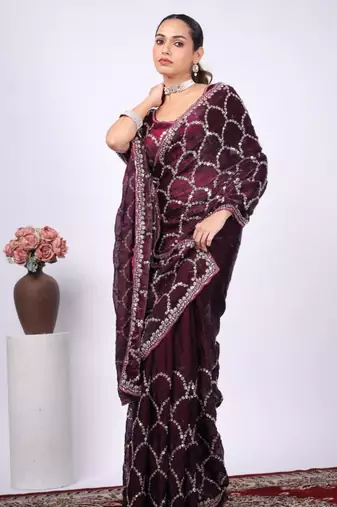 Celebrity type purple embroidered border fandy satin saree with unstitched blouse