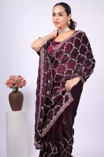Celebrity type purple embroidered border fandy satin saree with unstitched blouse
