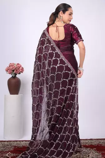 Celebrity type purple embroidered border fandy satin saree with unstitched blouse