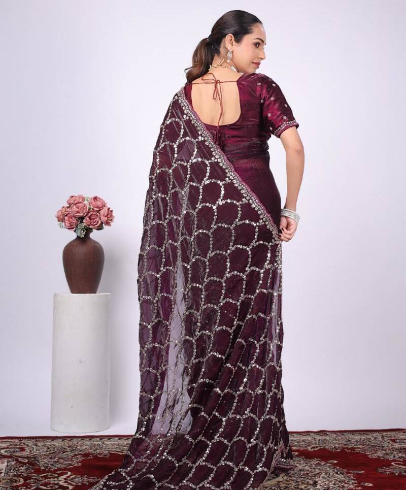 Celebrity type purple embroidered border fandy satin saree with unstitched blouse