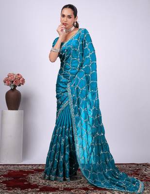 Traditional teal blue embroidered border fandy satin saree with unstitched blouse 1