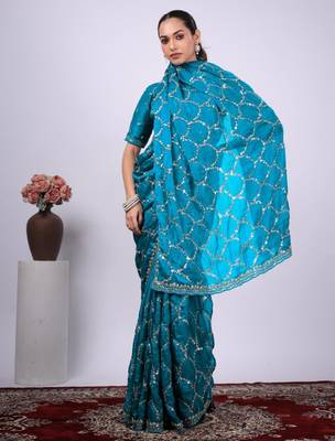 Traditional teal blue embroidered border fandy satin saree with unstitched blouse 2