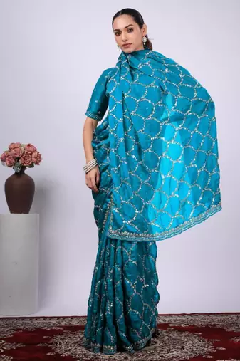 Traditional teal blue embroidered border fandy satin saree with unstitched blouse