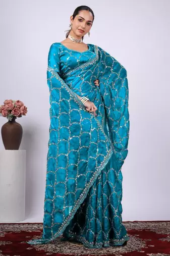 Traditional teal blue embroidered border fandy satin saree with unstitched blouse