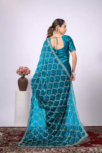 Traditional teal blue embroidered border fandy satin saree with unstitched blouse