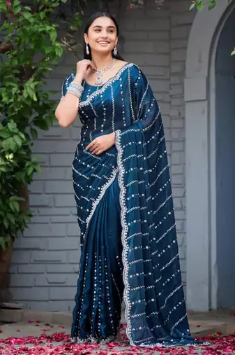 Ethnic midnight blue embellished pattern with border fandy satin saree with unstitched blouse