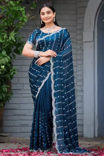 Ethnic midnight blue embellished pattern with border fandy satin saree with unstitched blouse