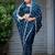 Ethnic midnight blue embellished pattern with border fandy satin saree with unstitched blouse