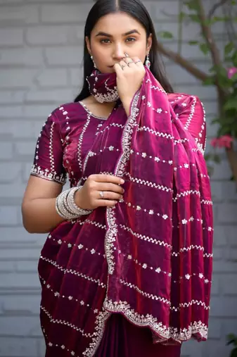 Traditional wine purple embellished pattern with border fandy satin saree with unstitched blouse