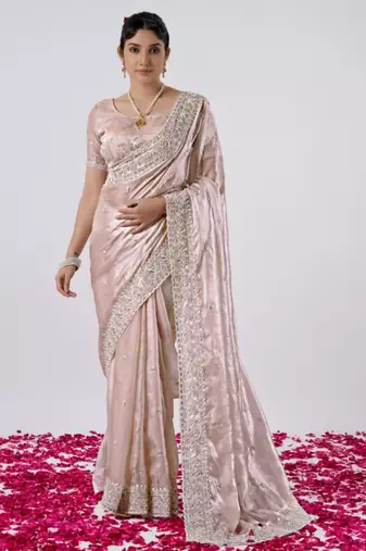 Fashionable peach designer border satin saree with unstitched blouse