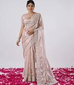 Fashionable peach designer border satin saree with unstitched blouse