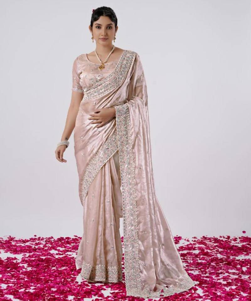 Fashionable peach designer border satin saree with unstitched blouse