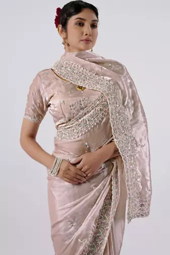 Fashionable peach designer border satin saree with unstitched blouse