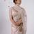 Fashionable peach designer border satin saree with unstitched blouse