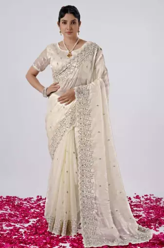 Elegance cream hevay sequin and stone border satin saree with unstitched blouse