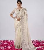 Elegance cream hevay sequin and stone border satin saree with unstitched blouse