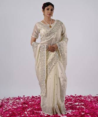 Elegance cream hevay sequin and stone border satin saree with unstitched blouse 2