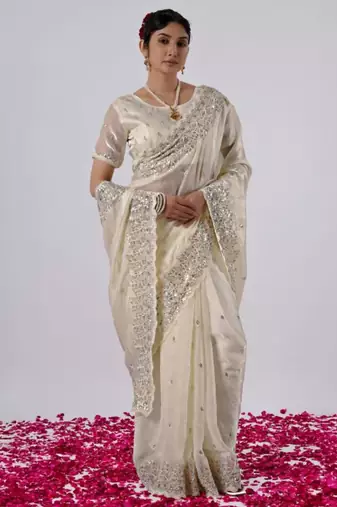 Elegance cream hevay sequin and stone border satin saree with unstitched blouse