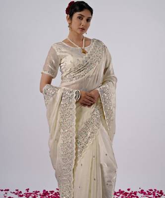 Elegance cream hevay sequin and stone border satin saree with unstitched blouse 3