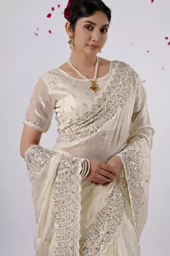 Elegance cream hevay sequin and stone border satin saree with unstitched blouse