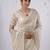 Elegance cream hevay sequin and stone border satin saree with unstitched blouse