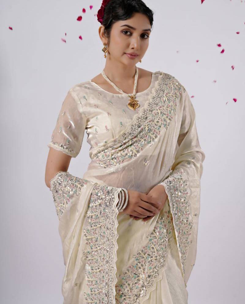 Elegance cream hevay sequin and stone border satin saree with unstitched blouse