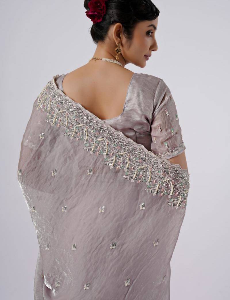 Latest lavendar hevay sequin and stone border satin saree with unstitched blouse