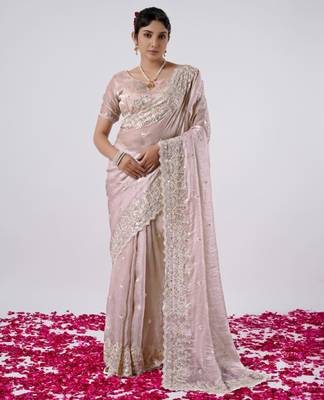 Celebrity inspired peach hevay sequin and stone border satin saree with unstitched blouse 1
