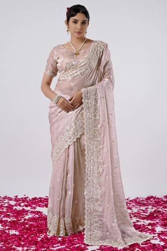 Celebrity inspired peach hevay sequin and stone border satin saree with unstitched blouse