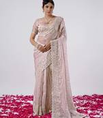 Celebrity inspired peach hevay sequin and stone border satin saree with unstitched blouse