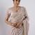 Celebrity inspired peach hevay sequin and stone border satin saree with unstitched blouse