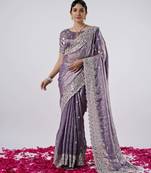Kanjivaram purple hevay sequin and stone border satin saree with unstitched blouse