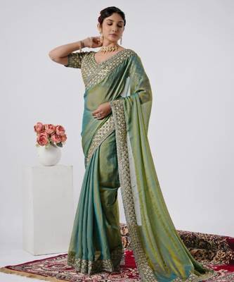 Celebrity type firozi heavy sequin border saree with unstitched blouse 1