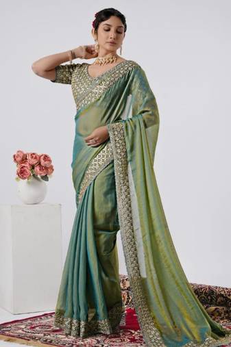 Celebrity type firozi heavy sequin border saree with unstitched blouse