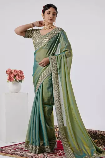 Celebrity type firozi heavy sequin border saree with unstitched blouse
