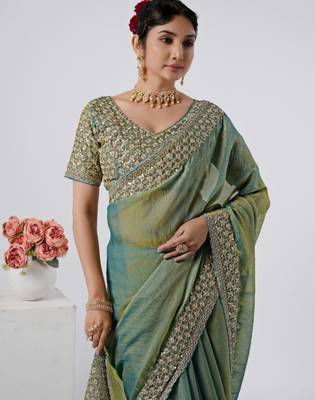 Celebrity type firozi heavy sequin border saree with unstitched blouse 2