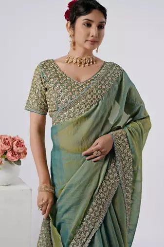 Celebrity type firozi heavy sequin border saree with unstitched blouse