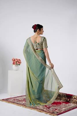 Celebrity type firozi heavy sequin border saree with unstitched blouse 4